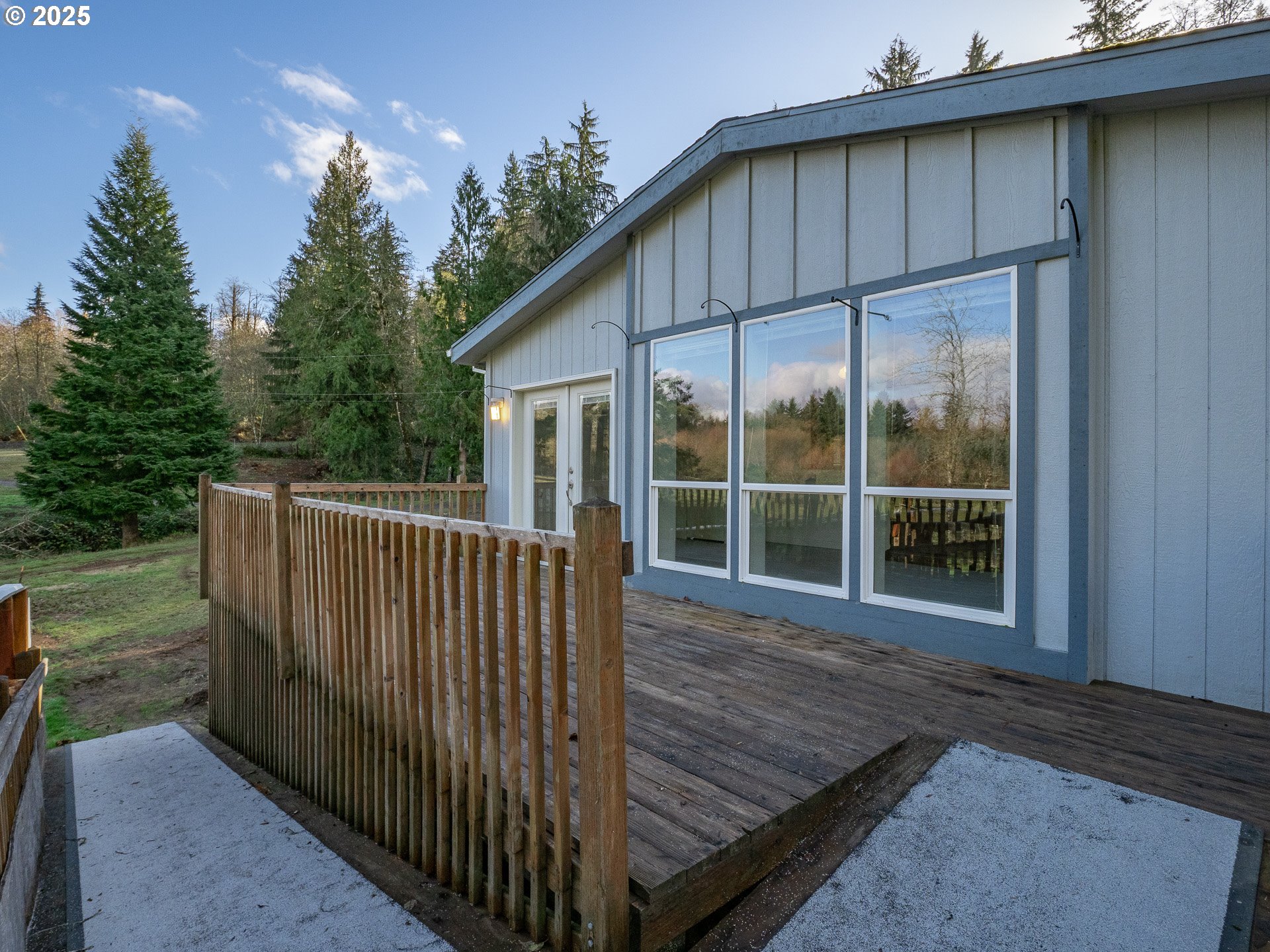 44300 Southeast Sandercock Lane Sandy, OR 97055 - Photo 3 of 48 a view of a house with backyard and deck