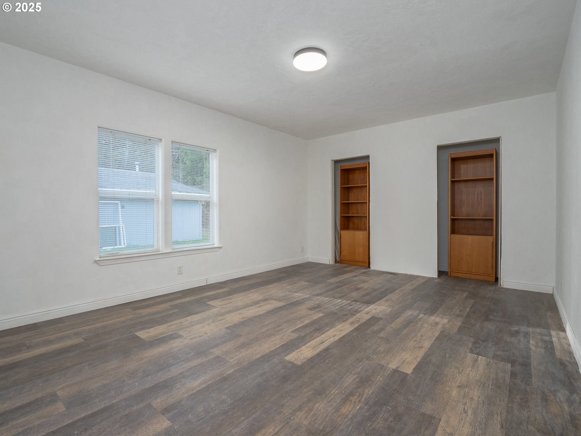 44300 Southeast Sandercock Lane Sandy, OR 97055 - Photo 32 of 48 a view of an empty room with window and closet area