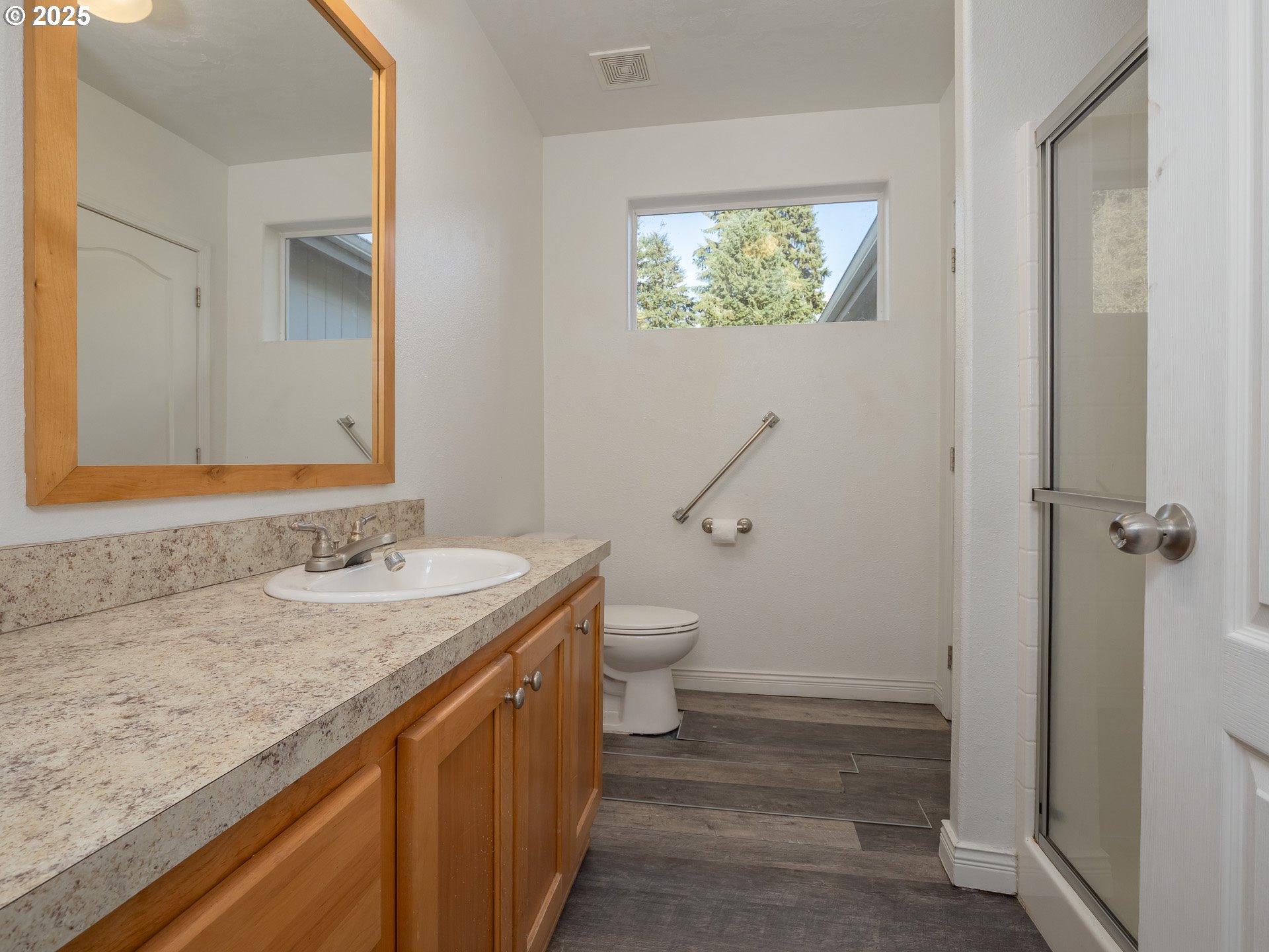 44300 Southeast Sandercock Lane Sandy, OR 97055 - Photo 34 of 48 a bathroom with a granite countertop sink toilet and a mirror