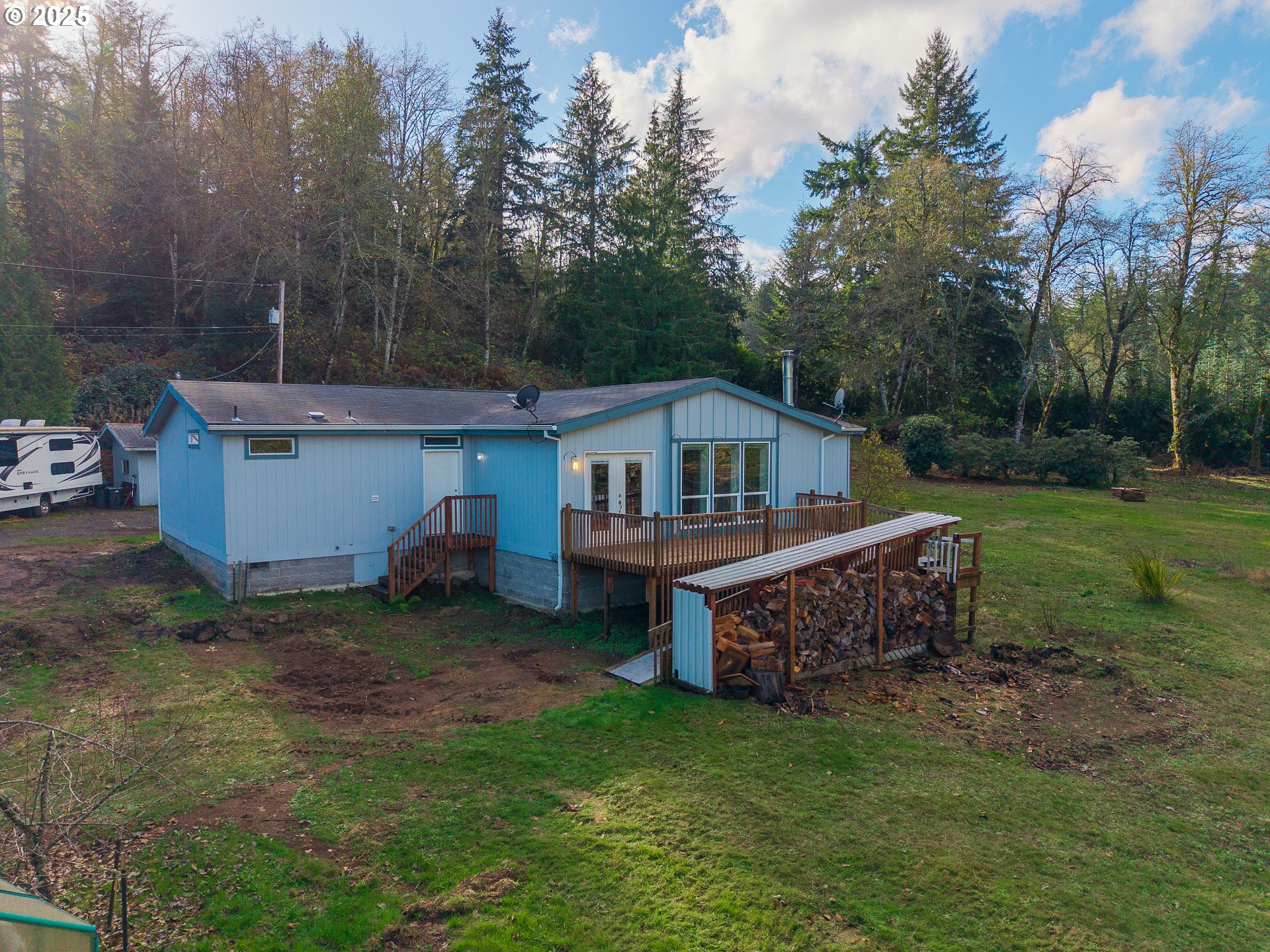 44300 Southeast Sandercock Lane Sandy, OR 97055 - Photo 36 of 48 a front view of a house with garden