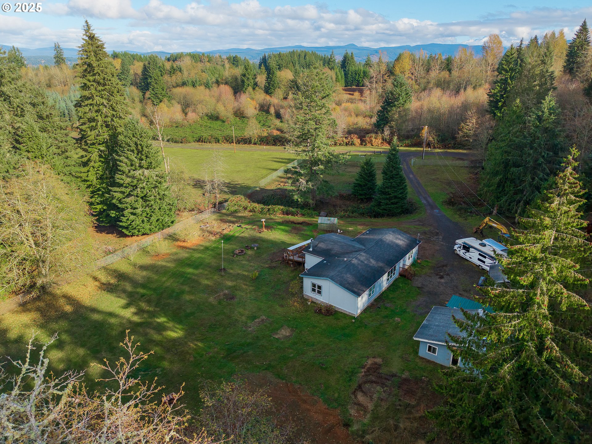 44300 Southeast Sandercock Lane Sandy, OR 97055 - Photo 40 of 48 a view of a lake with a yard