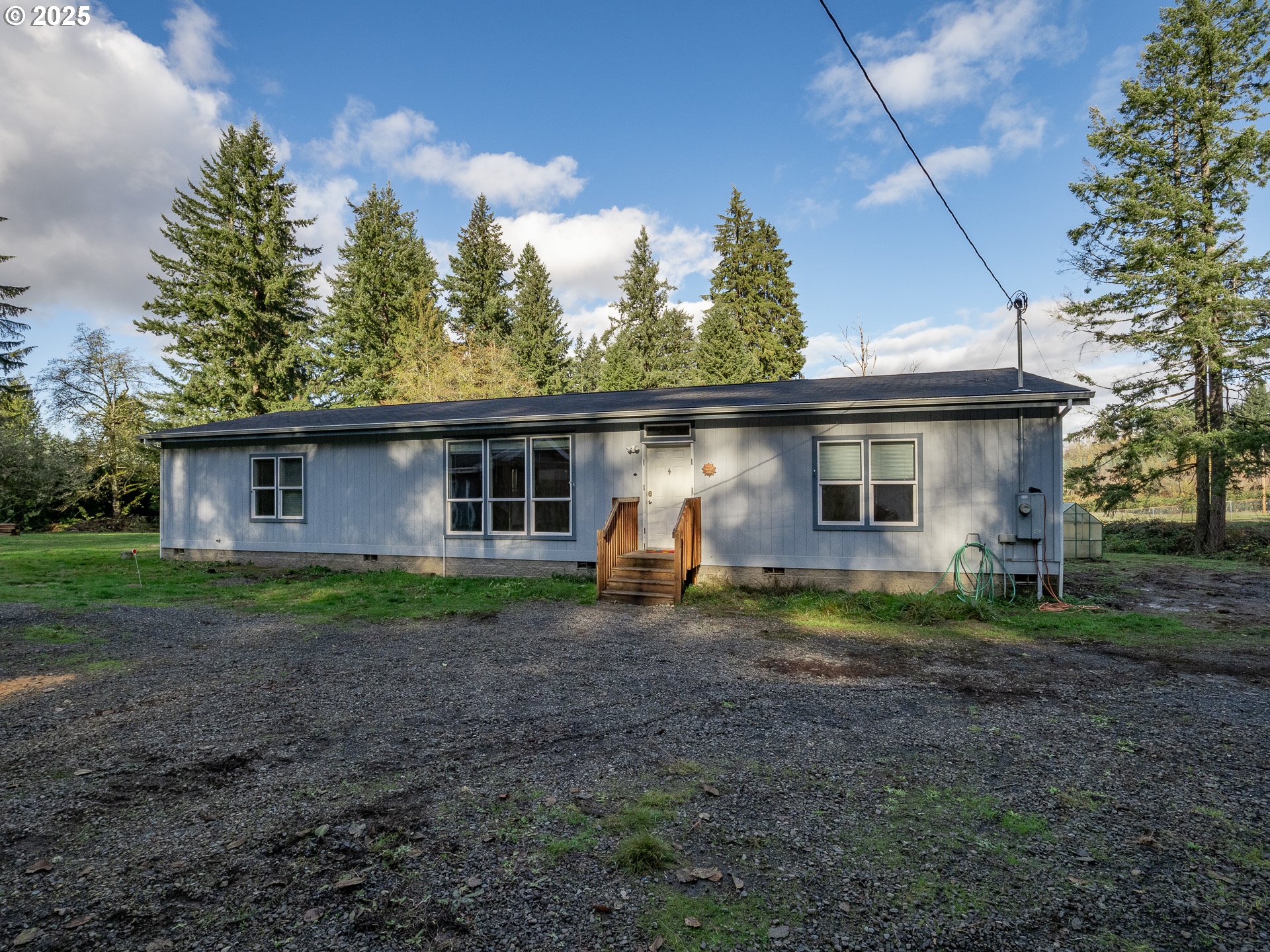 44300 Southeast Sandercock Lane Sandy, OR 97055 - Photo 6 of 48 a view of a house with backyard