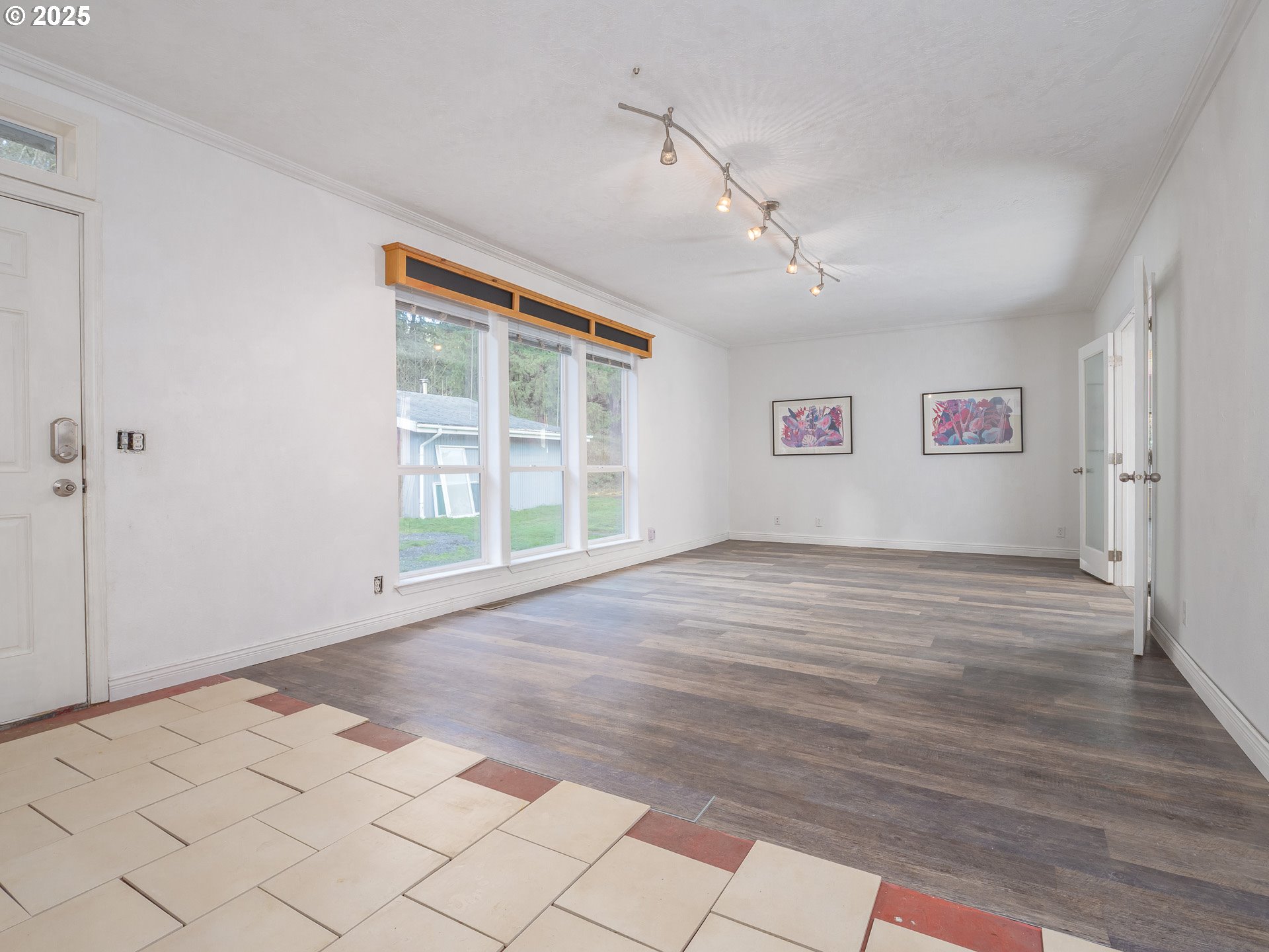 44300 Southeast Sandercock Lane Sandy, OR 97055 - Photo 8 of 48 a view of an empty room with a window