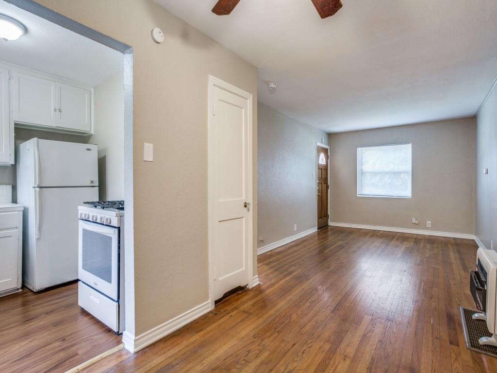 902 Denton Street Denton, TX 76201 - Photo 4 of 11 Clear view showing the easy flow from the living room to the kitchen