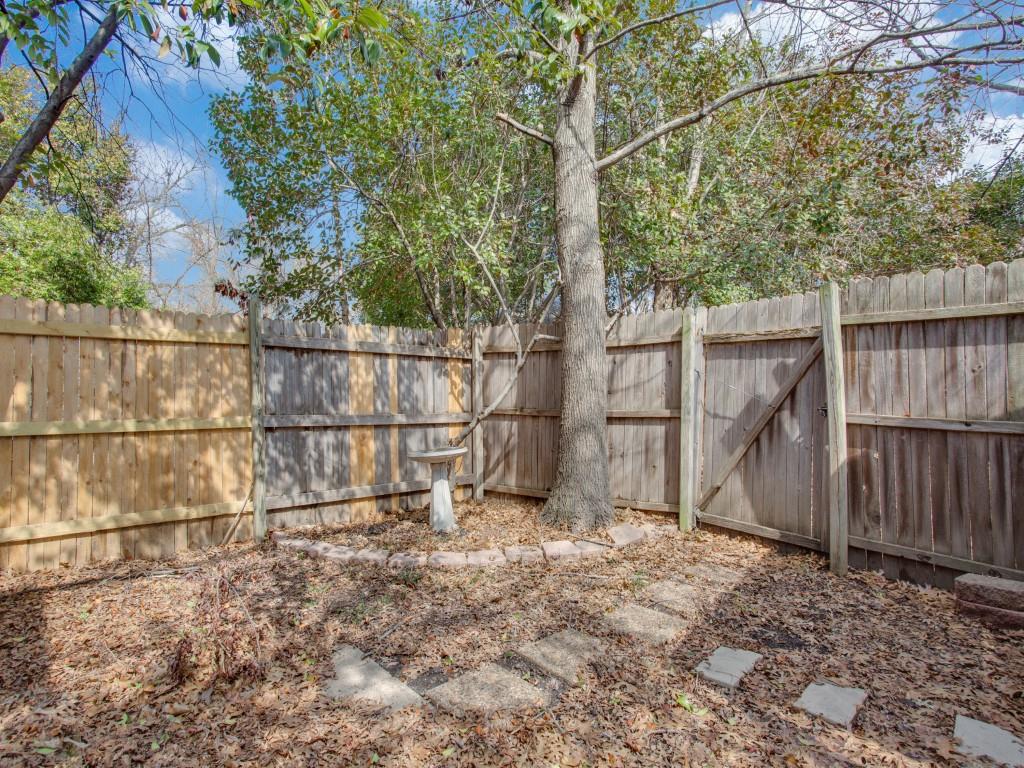 902 Denton Street Denton, TX 76201 - Photo 9 of 11 Private, fenced-in backyard with lots of shade from trees.