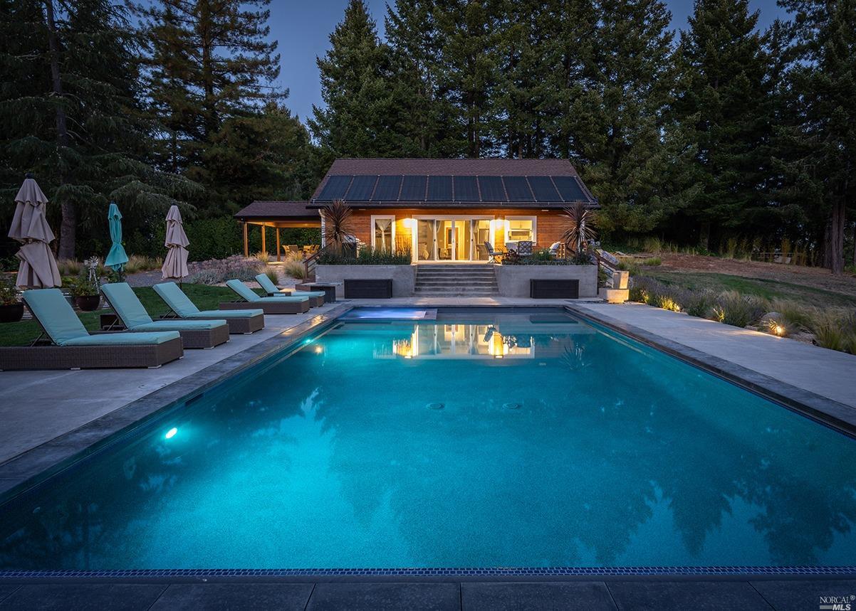 3299 Frei Road Sebastopol, CA 95472 - Photo 1 of 1 a backyard of a house with table and chairs