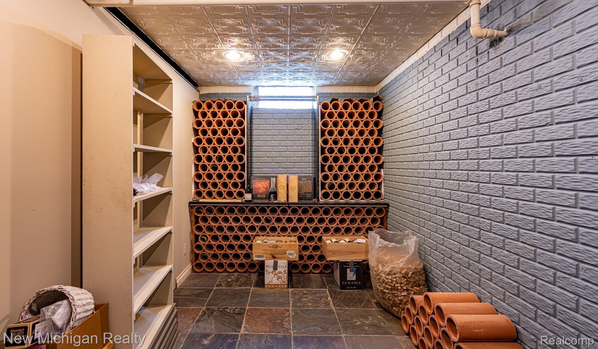 724 Lakeville Road Leonard, MI 48367 - Photo 28 of 31 safe room wine cellar.jpg