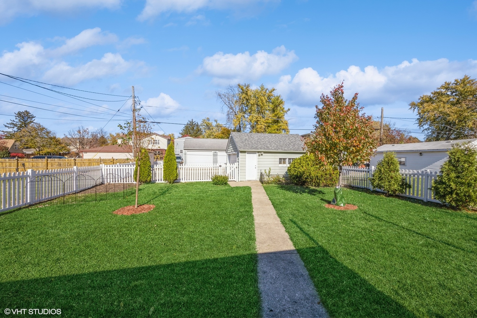 9542 Monroe Avenue Brookfield, IL 60513 - Photo 17 of 21 a view of a house with a back yard