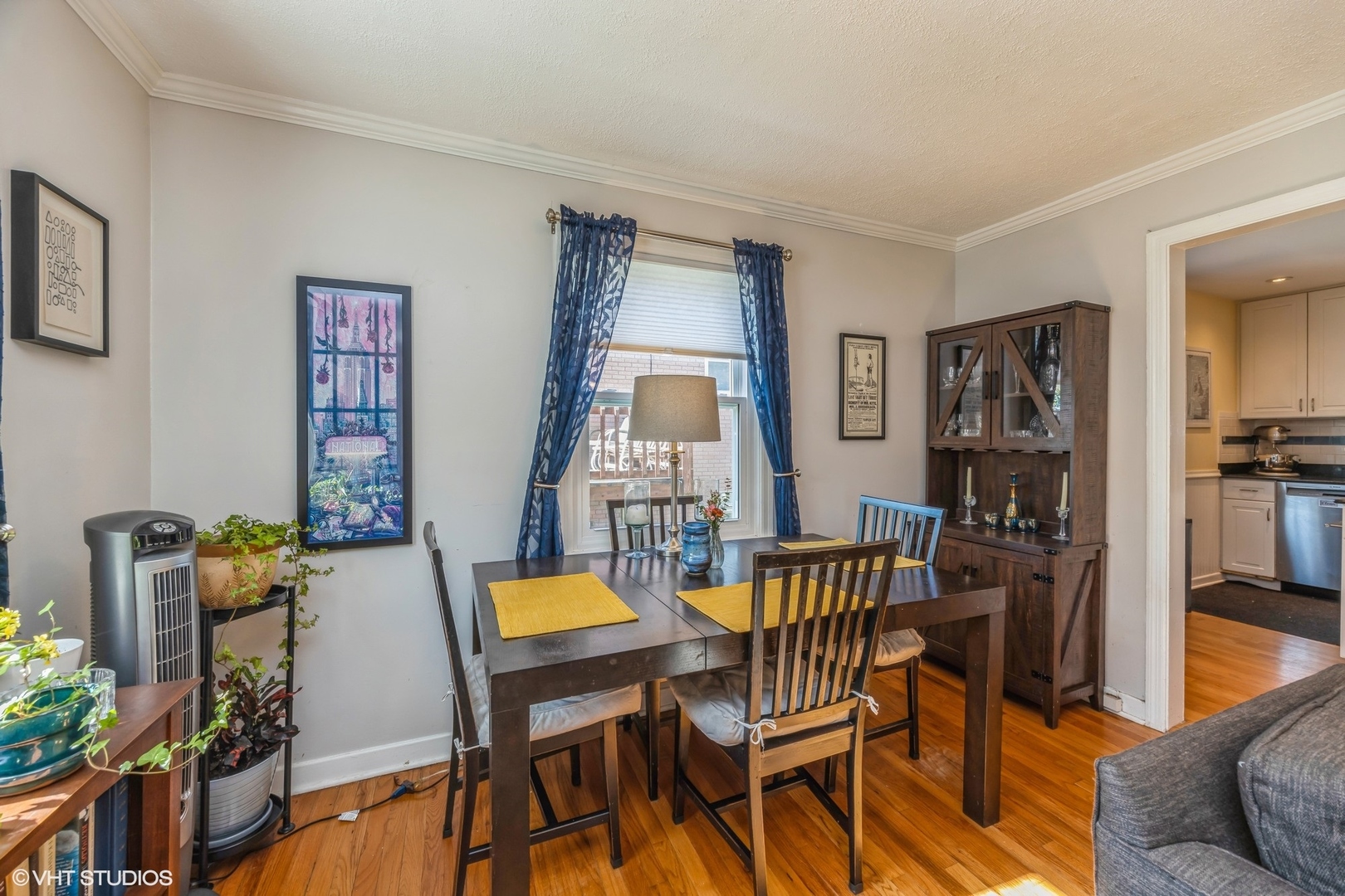 9542 Monroe Avenue Brookfield, IL 60513 - Photo 5 of 21 a view of a dining room with furniture and wooden floor