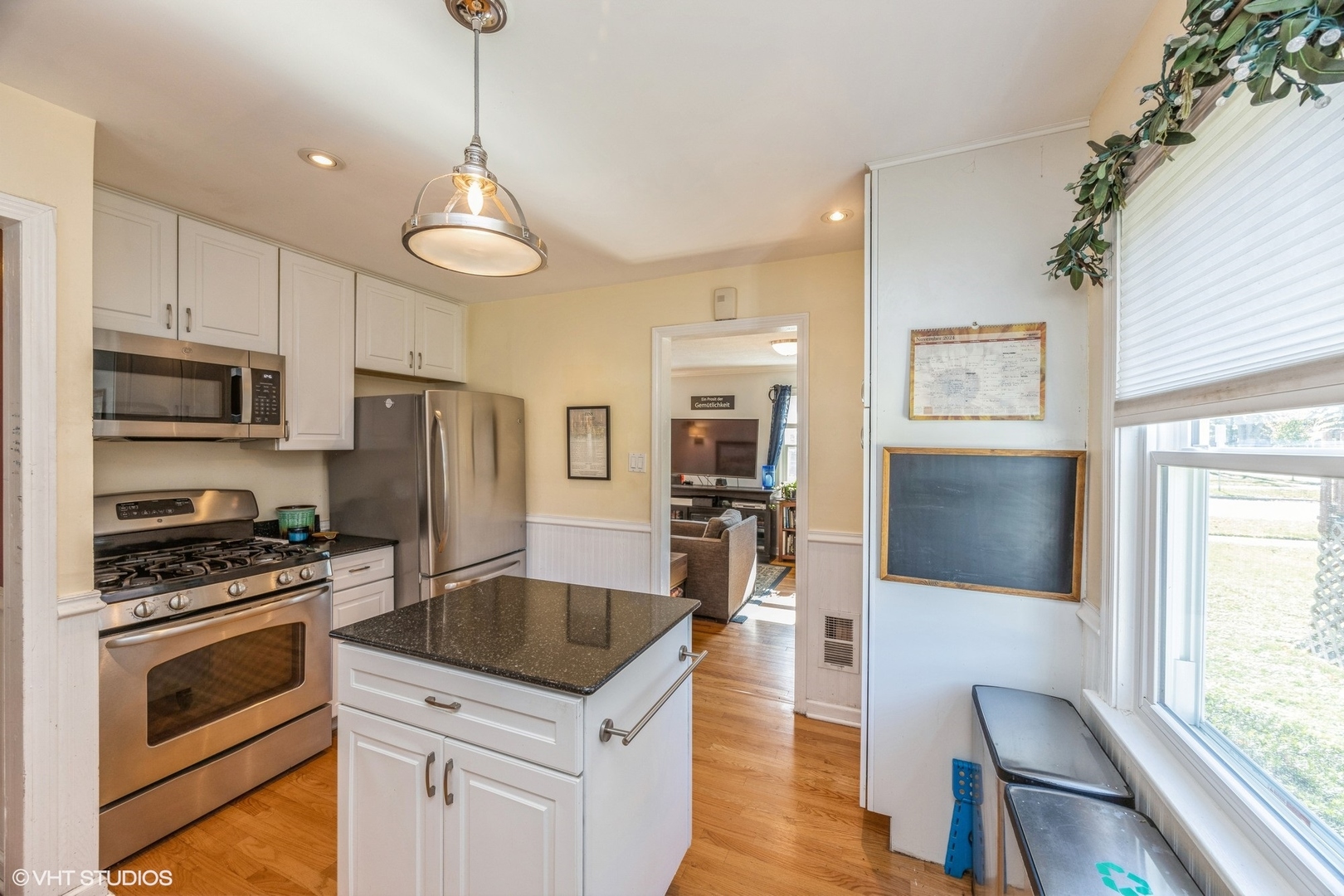 9542 Monroe Avenue Brookfield, IL 60513 - Photo 8 of 21 a kitchen with stainless steel appliances a stove a refrigerator and a sink