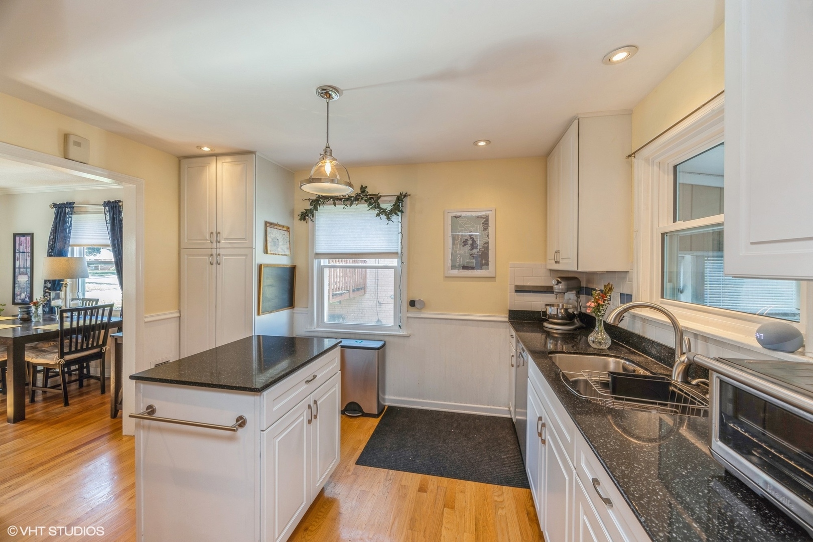 9542 Monroe Avenue Brookfield, IL 60513 - Photo 9 of 21 a kitchen with a stove sink and refrigerator