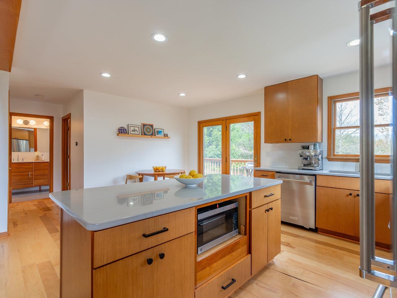 6041 Williams Run Road Port Republic, VA 24471 - Photo 23 of 68 a kitchen that has a lot of cabinets in it and wooden floors