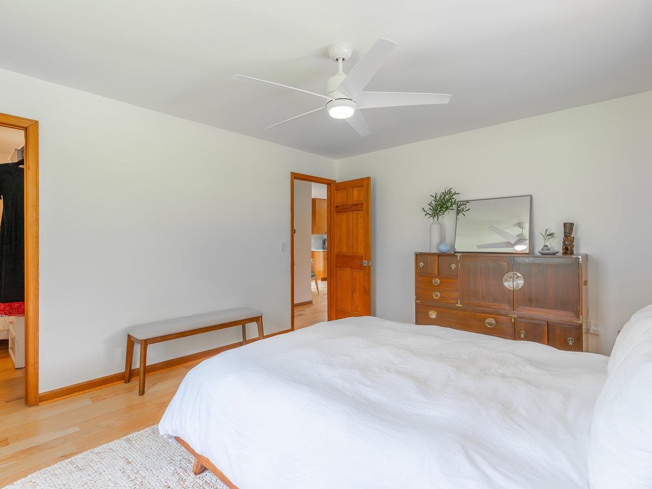 6041 Williams Run Road Port Republic, VA 24471 - Photo 24 of 68 a bedroom with a large bed and a chandelier
