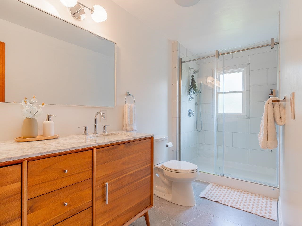 6041 Williams Run Road Port Republic, VA 24471 - Photo 28 of 68 a bathroom with a granite countertop sink toilet and shower