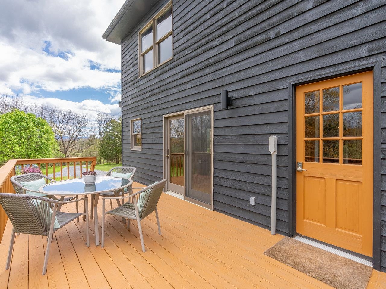 6041 Williams Run Road Port Republic, VA 24471 - Photo 41 of 68 a view of a patio with table and chairs with wooden floor and fence