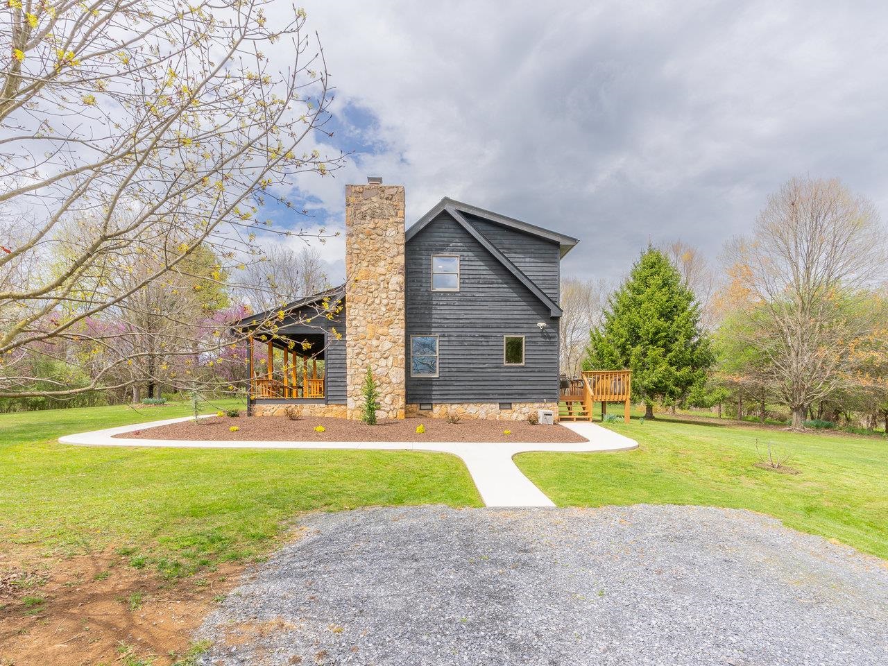 6041 Williams Run Road Port Republic, VA 24471 - Photo 51 of 68 a view of a house with a big yard and large trees