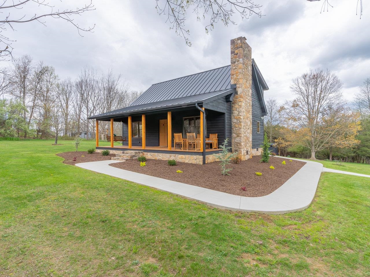 6041 Williams Run Road Port Republic, VA 24471 - Photo 7 of 68 a view of a house with swimming pool and a yard