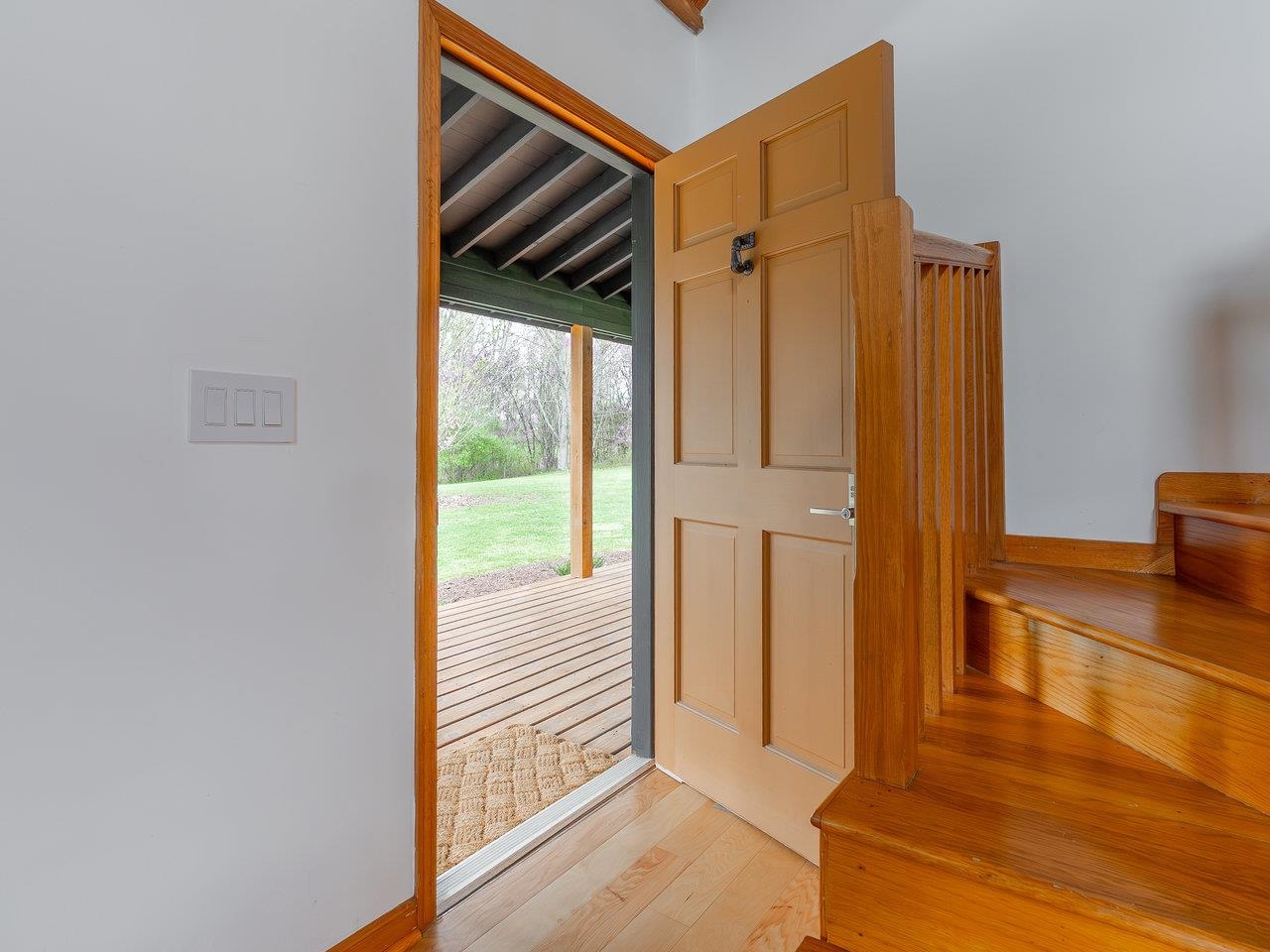 6041 Williams Run Road Port Republic, VA 24471 - Photo 9 of 68 a view of a hallway with wooden floor and glass door