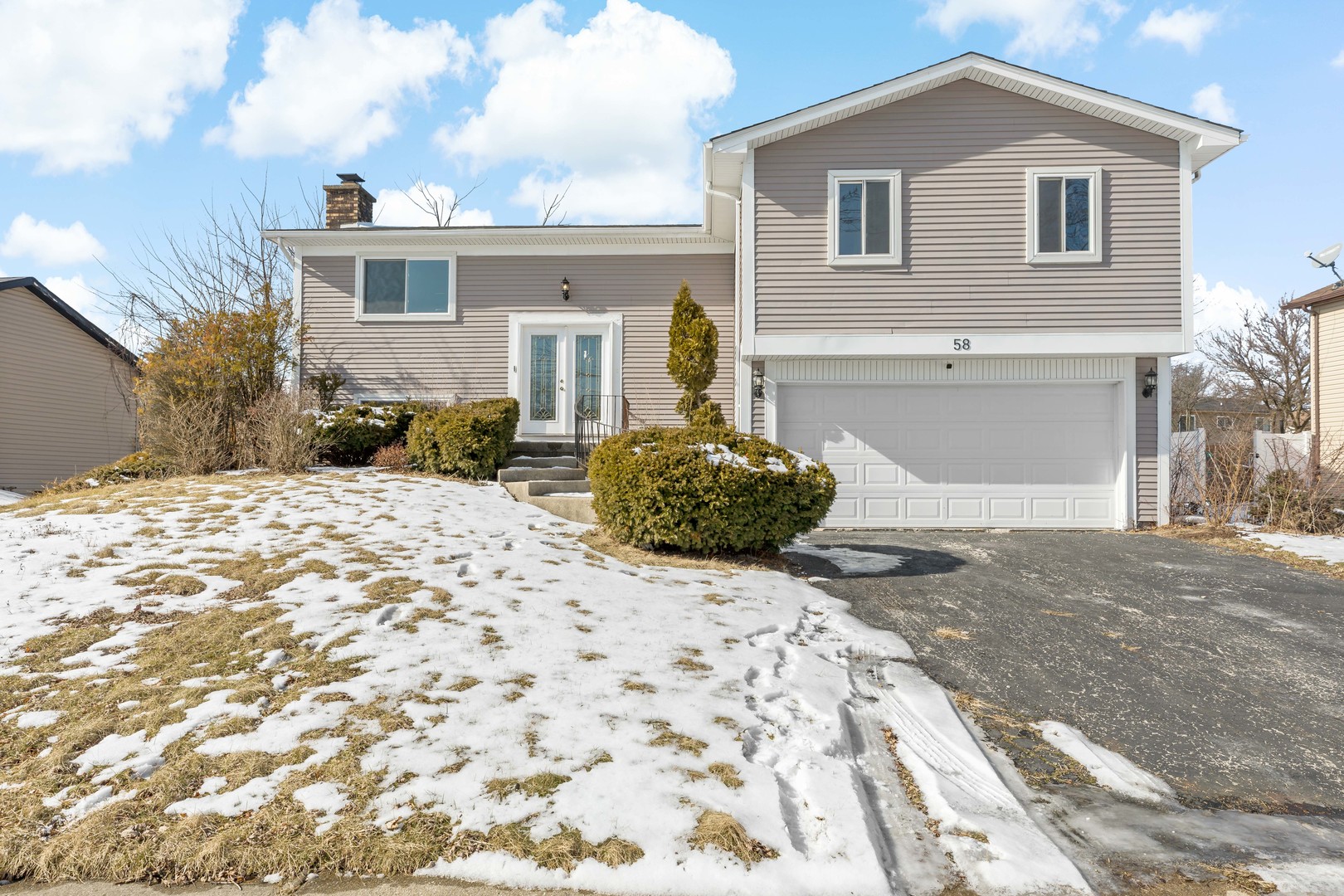58 Cloverleaf Road Matteson, IL 60443 - Photo 1 of 19 a front view of a house with a yard