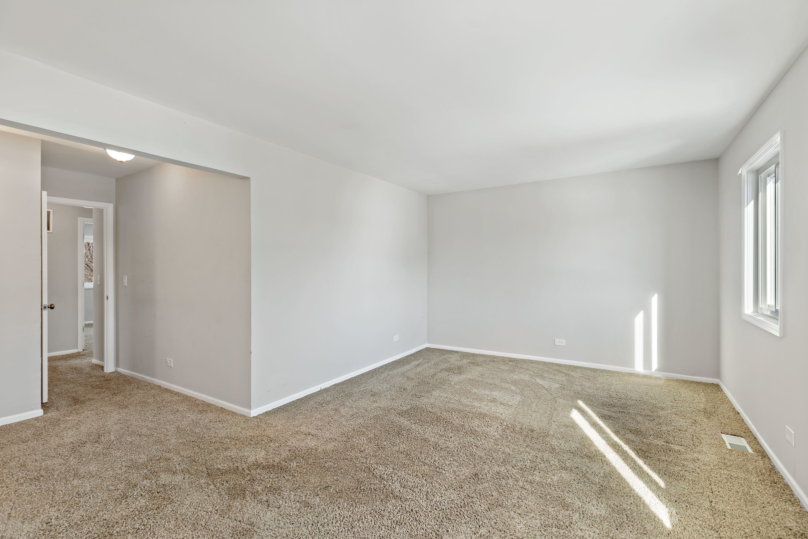 58 Cloverleaf Road Matteson, IL 60443 - Photo 11 of 19 a view of an empty room and window