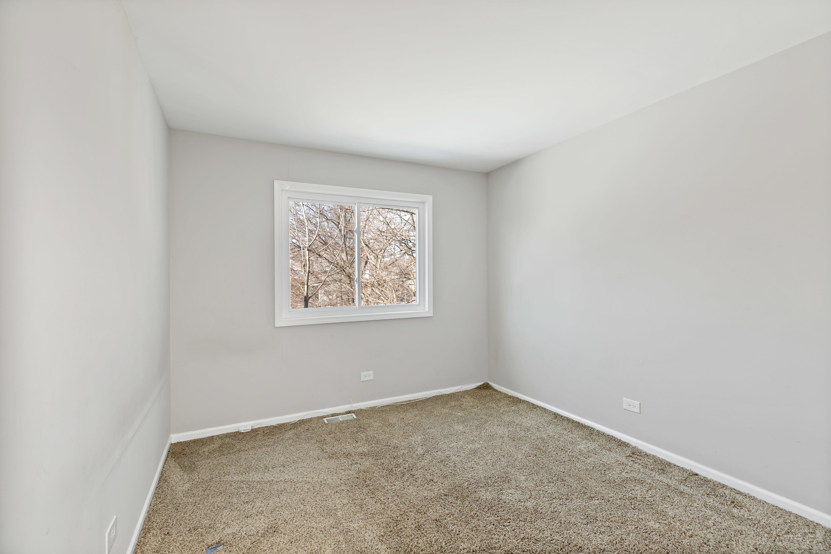 58 Cloverleaf Road Matteson, IL 60443 - Photo 14 of 19 an empty room with a workbench