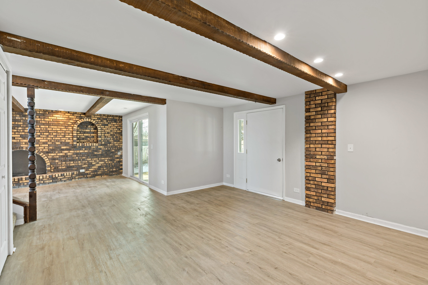 58 Cloverleaf Road Matteson, IL 60443 - Photo 17 of 19 an empty room with wooden floor and windows