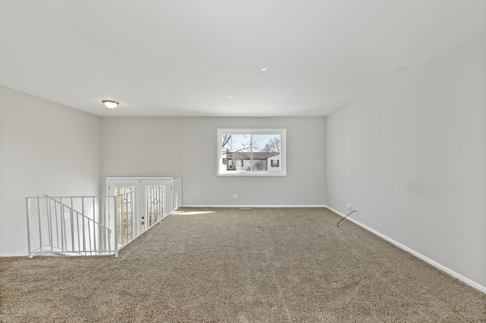 58 Cloverleaf Road Matteson, IL 60443 - Photo 4 of 19 an empty room with windows