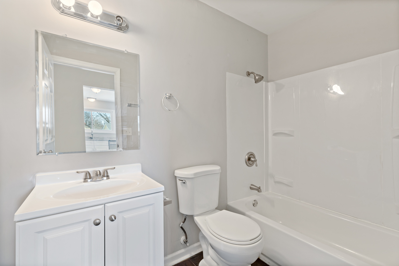 58 Cloverleaf Road Matteson, IL 60443 - Photo 8 of 19 a bathroom with a sink a toilet and shower