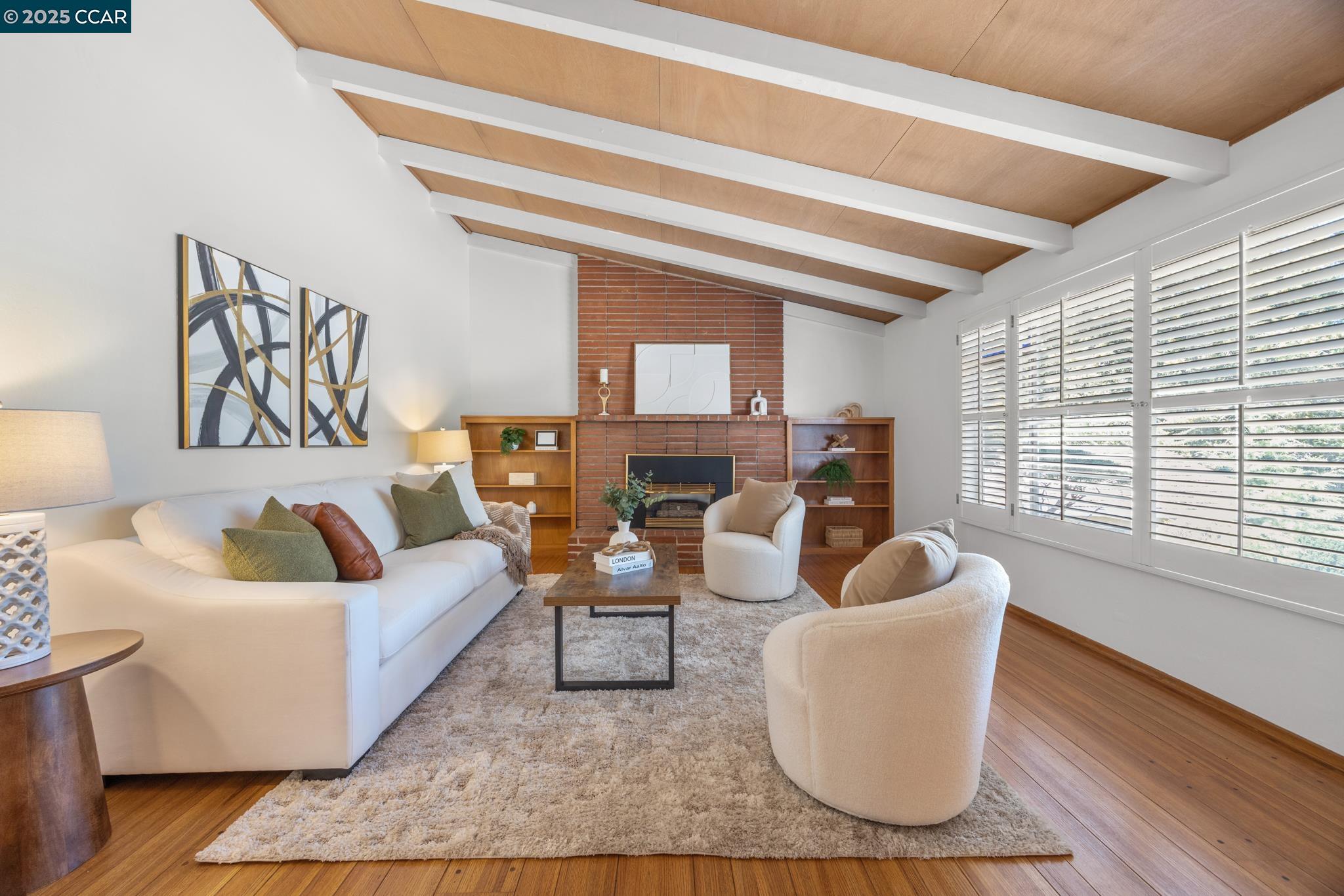 2101 Hillview Drive Walnut Creek, CA 94596 - Photo 1 of 1 a living room with furniture and a large window