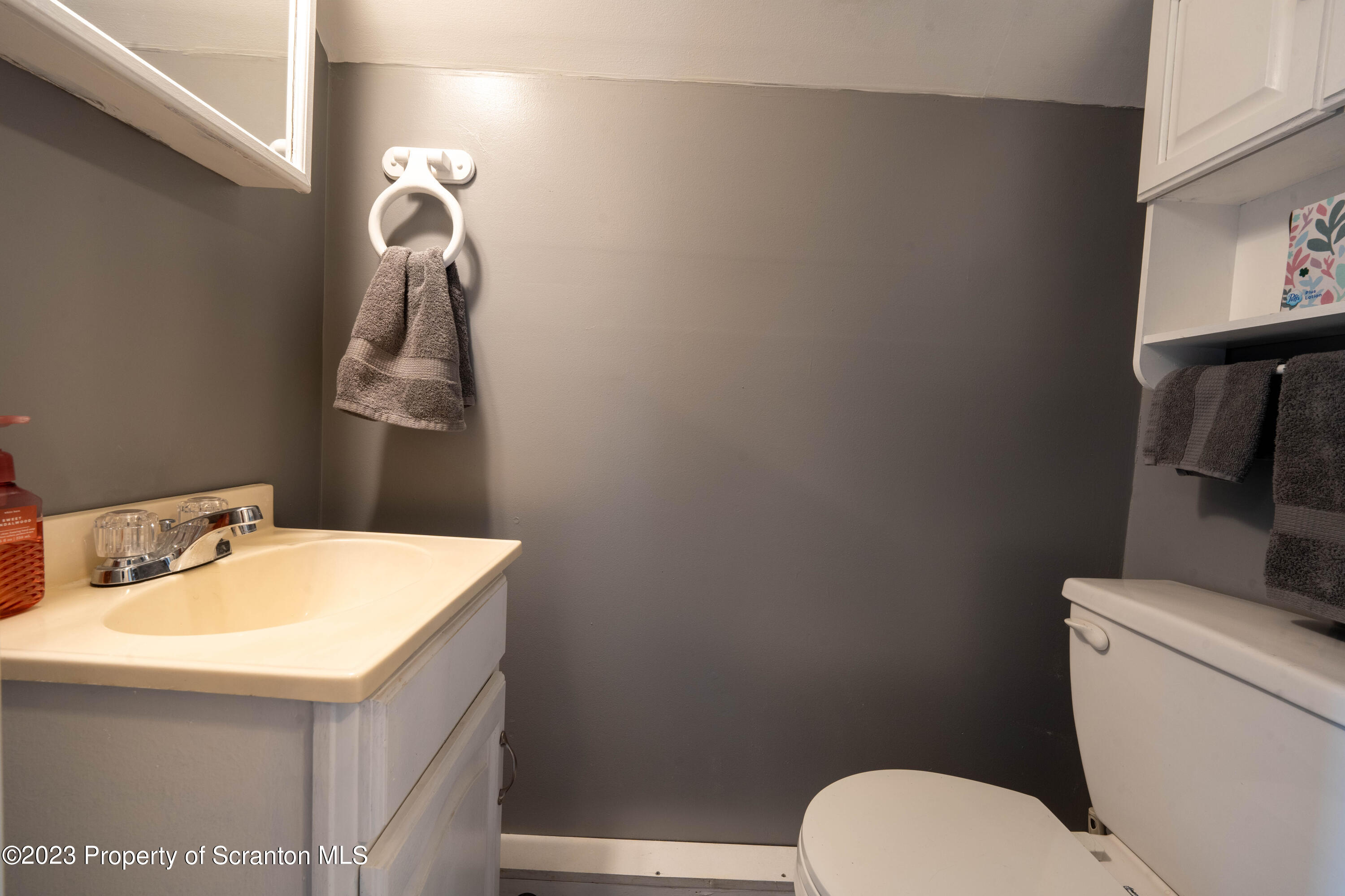 2759 State Rte 3011 Meshoppen, PA 18630 - Photo 14 of 30 a bathroom with a sink a toilet and mirror