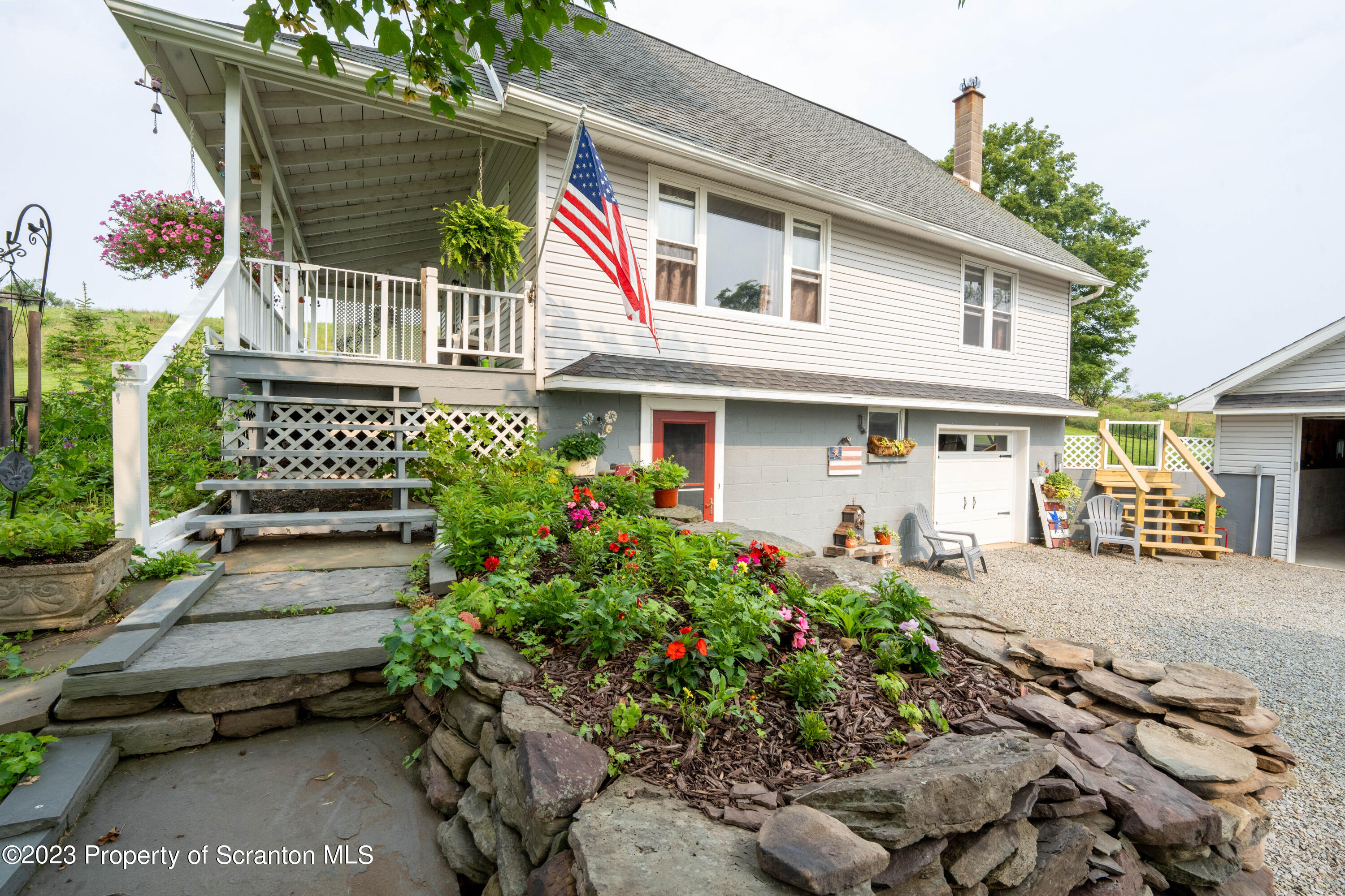 2759 State Rte 3011 Meshoppen, PA 18630 - Photo 21 of 30 a front view of a house with a garden