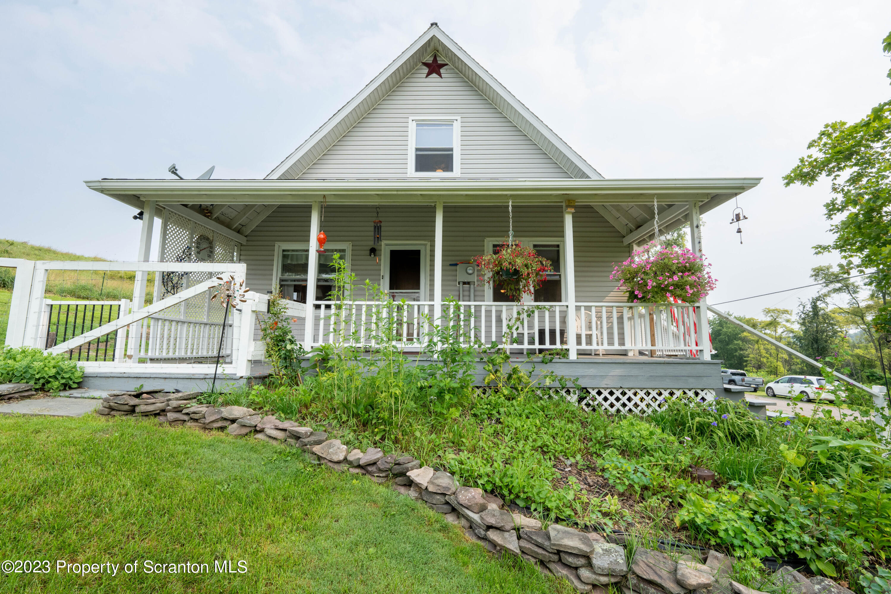 2759 State Rte 3011 Meshoppen, PA 18630 - Photo 23 of 30 front view of a house with a yard