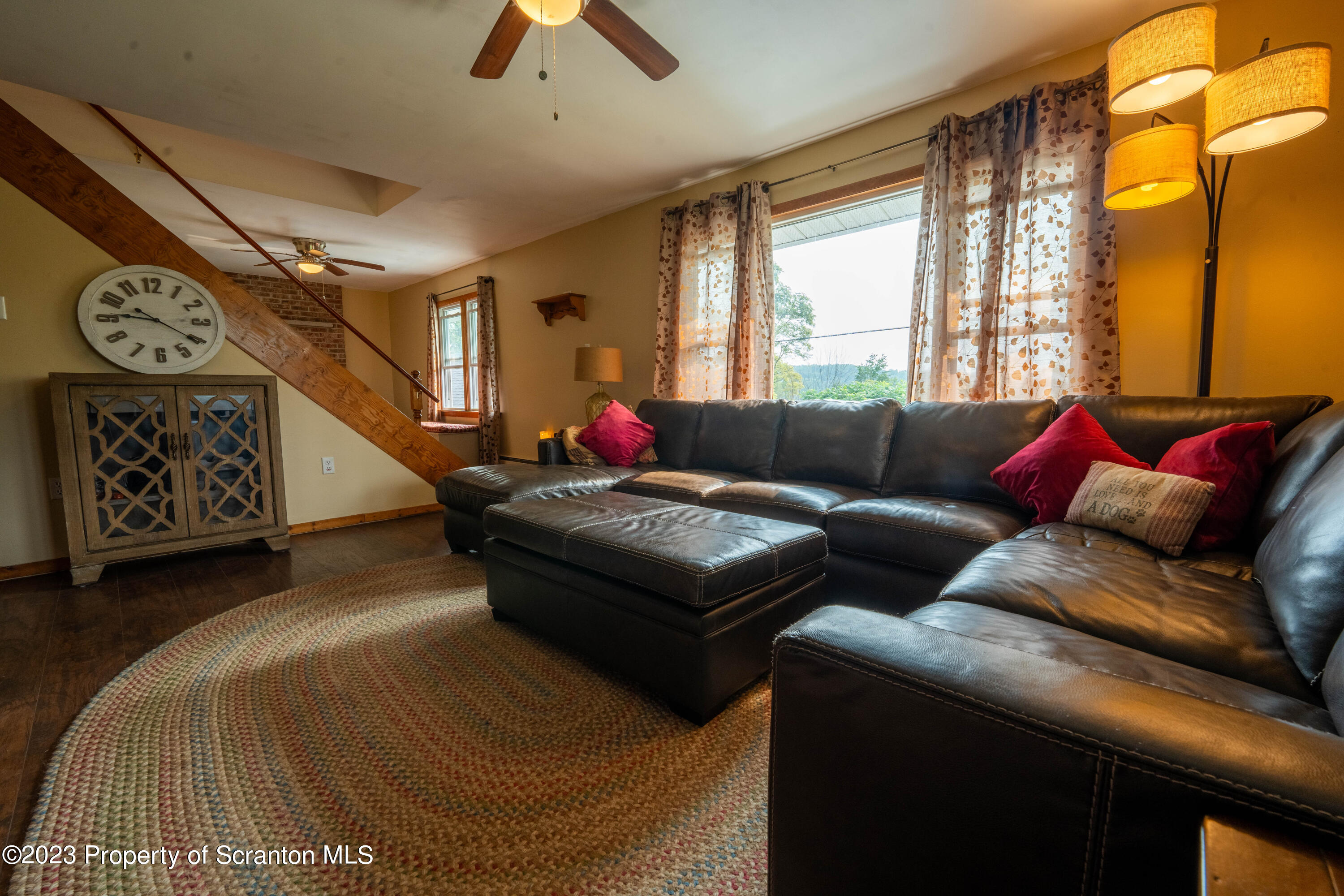 2759 State Rte 3011 Meshoppen, PA 18630 - Photo 3 of 30 a living room with furniture and a window