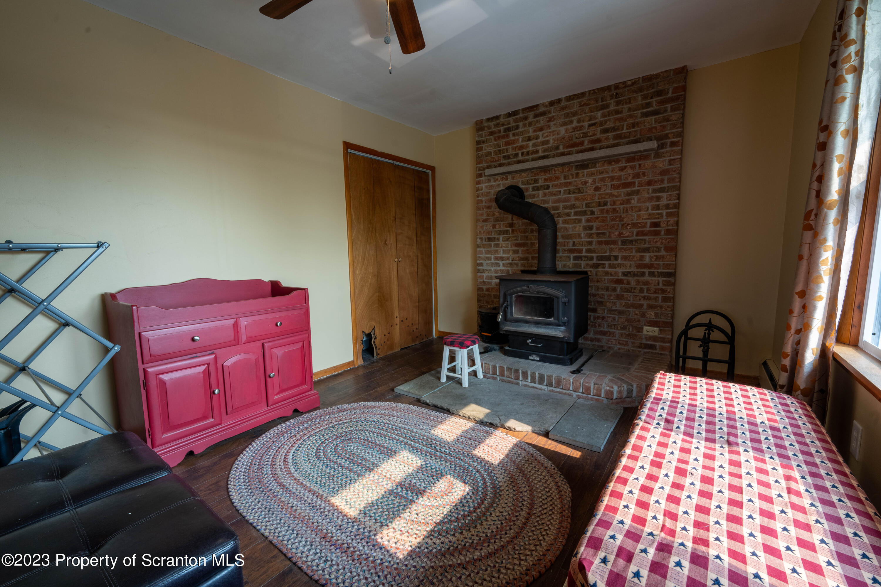 2759 State Rte 3011 Meshoppen, PA 18630 - Photo 8 of 30 a living room with furniture and a fireplace