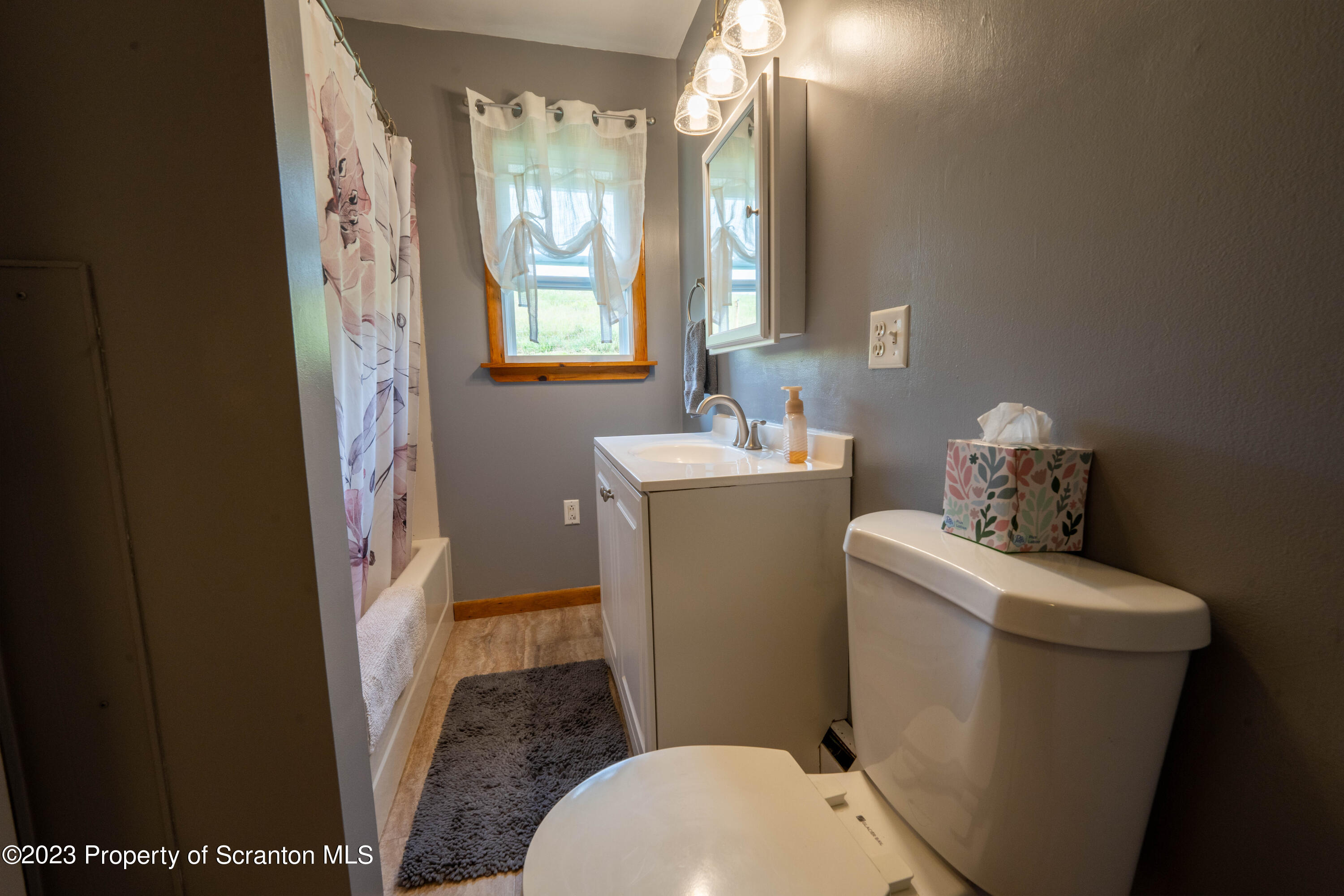 2759 State Rte 3011 Meshoppen, PA 18630 - Photo 9 of 30 a bathroom with a toilet sink and mirror