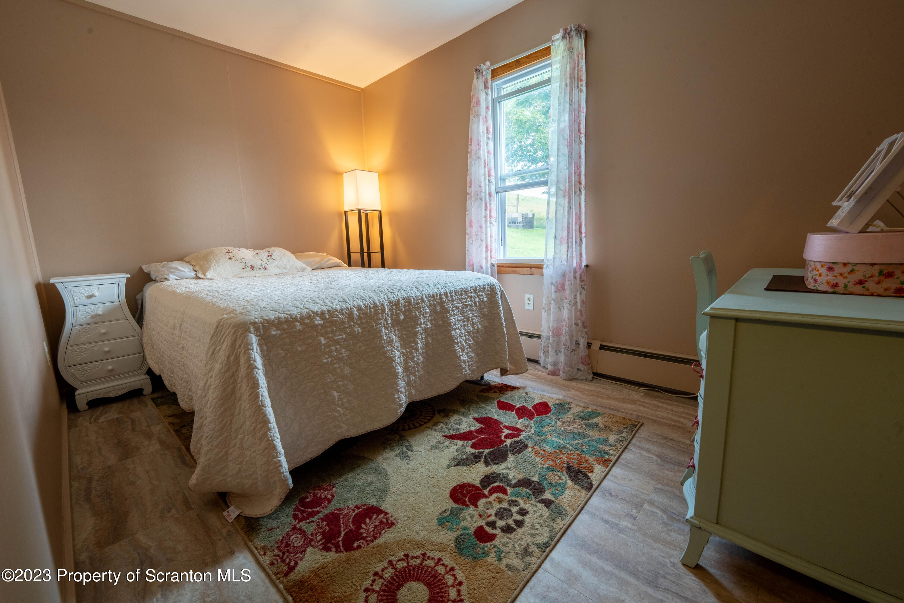 2759 State Rte 3011 Meshoppen, PA 18630 - Photo 10 of 30 a bed sitting in a bedroom next to a window