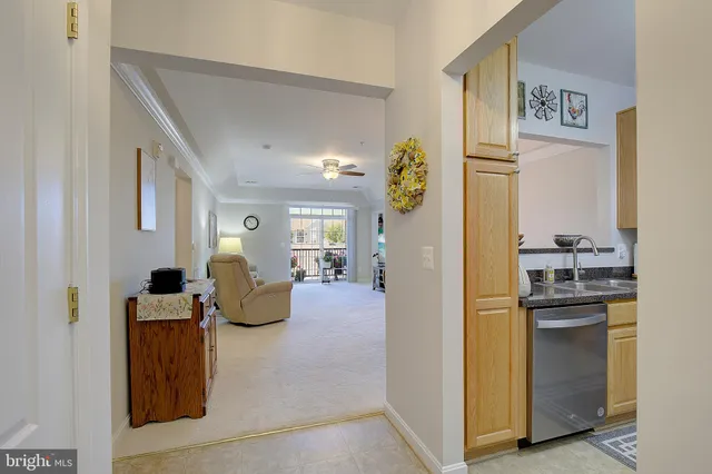 a view of living room with furniture and window
