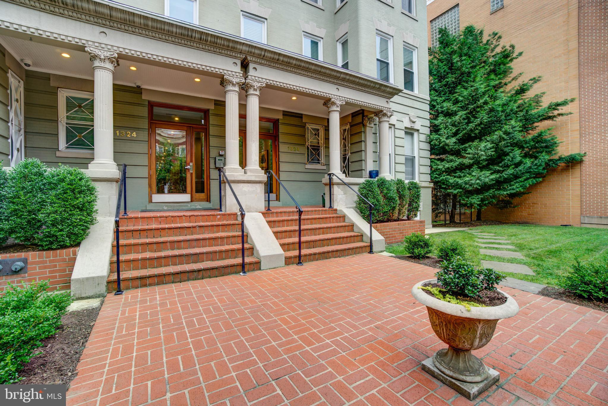 1324 Euclid Street Northwest, Unit 3 Washington, DC 20009 - Photo 20 of 23 a front view of a house with a garden