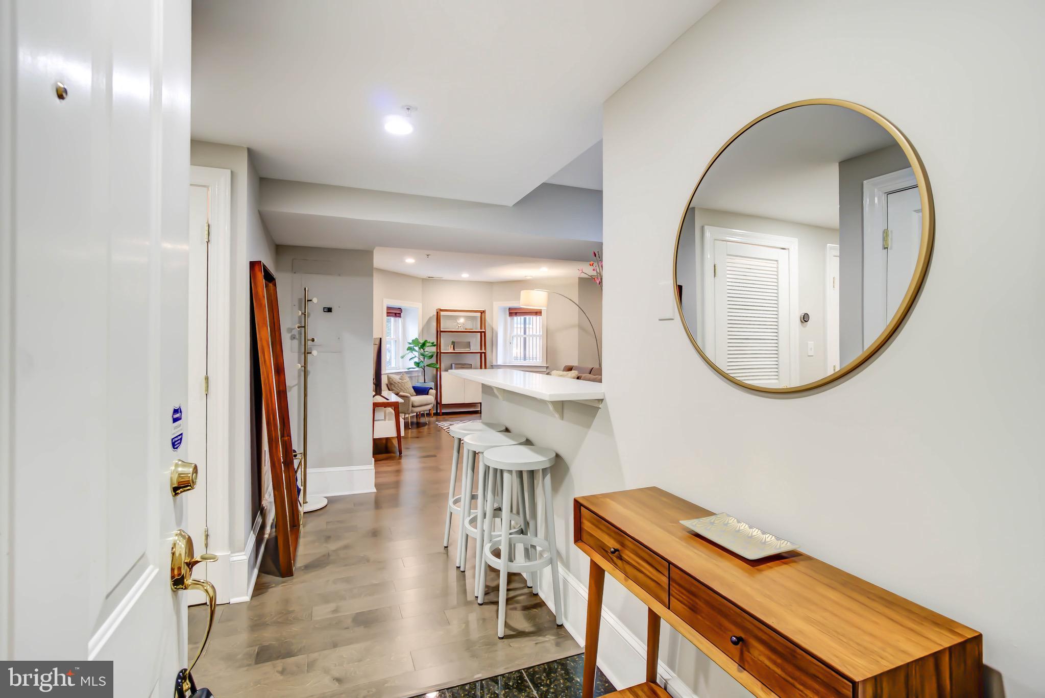 1324 Euclid Street Northwest, Unit 3 Washington, DC 20009 - Photo 4 of 23 wooden floor and dining room with wooden floor