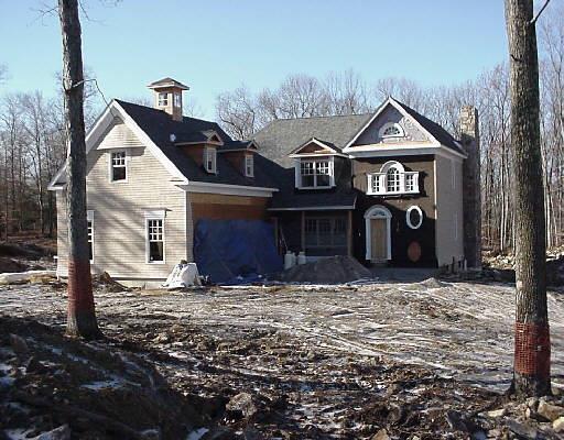 62 Merwin Brook Road Brookfield, CT 06804 - Photo 1 of 1 a front view of a house with a yard