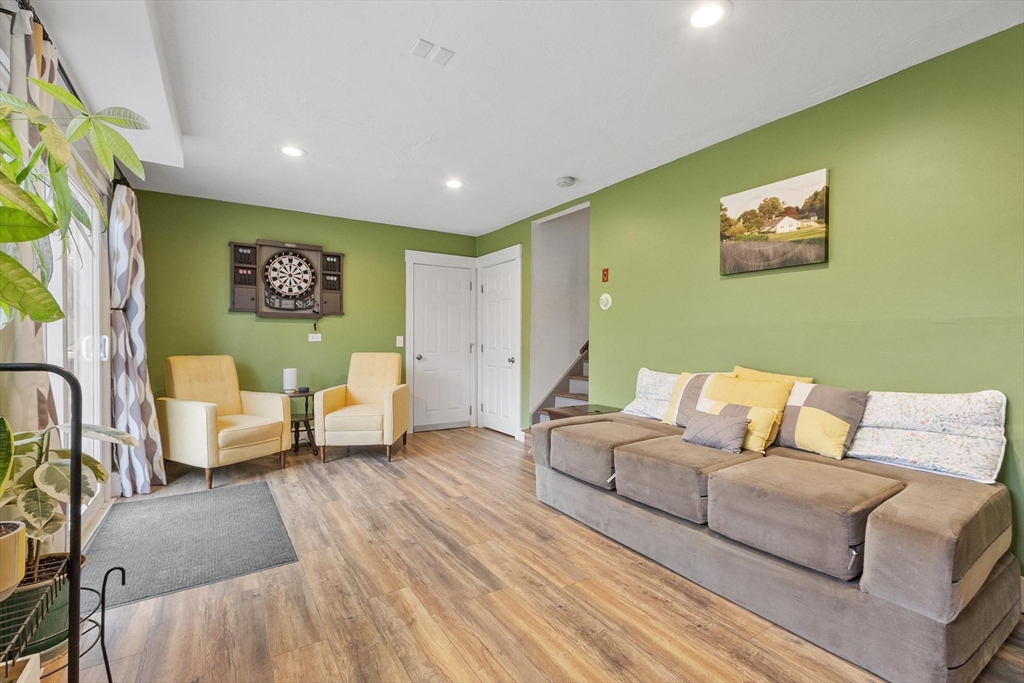 101 Williams Road Ashburnham, MA 01430 - Photo 27 of 42 a living room with furniture and a flat screen tv