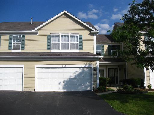 916 Moultrie Court Naperville, IL 60563 - Photo 1 of 1 a view of a house with a yard and plants