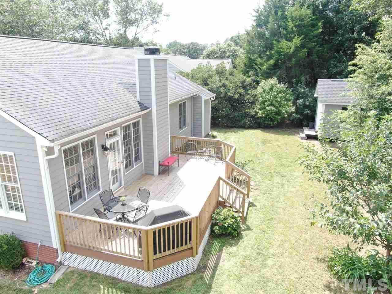 9304 Dawnshire Road Raleigh, NC 27615 - Photo 25 of 30 front view of a house with a deck