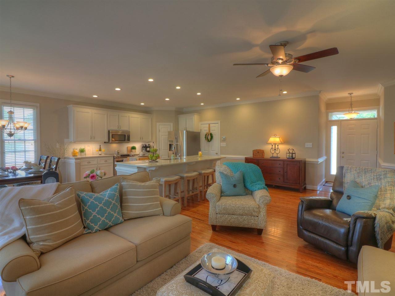 9304 Dawnshire Road Raleigh, NC 27615 - Photo 8 of 30 a living room with furniture and kitchen view