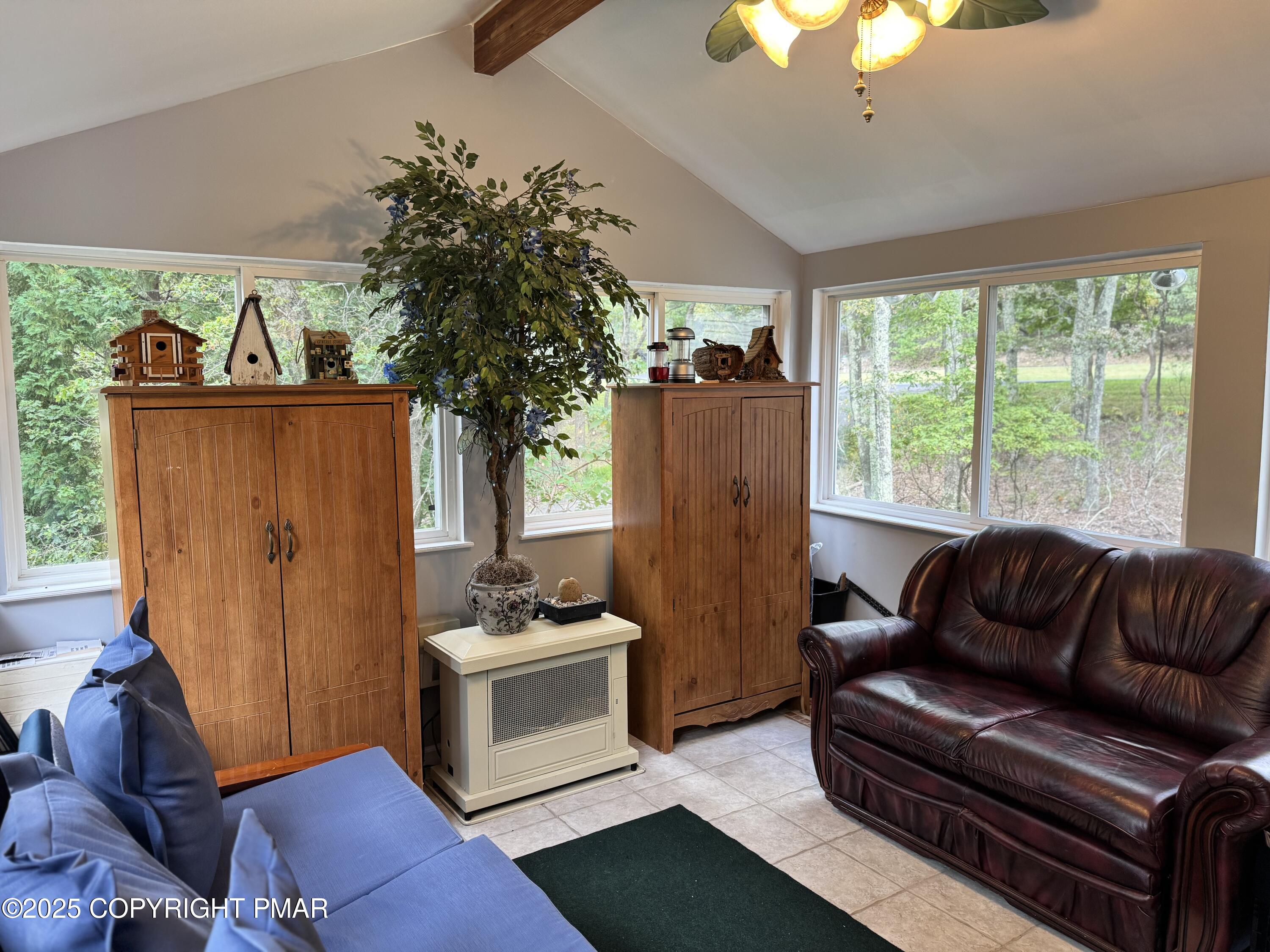 692 Watercrest Avenue Effort, PA 18330 - Photo 13 of 40 a living room with furniture and a large window
