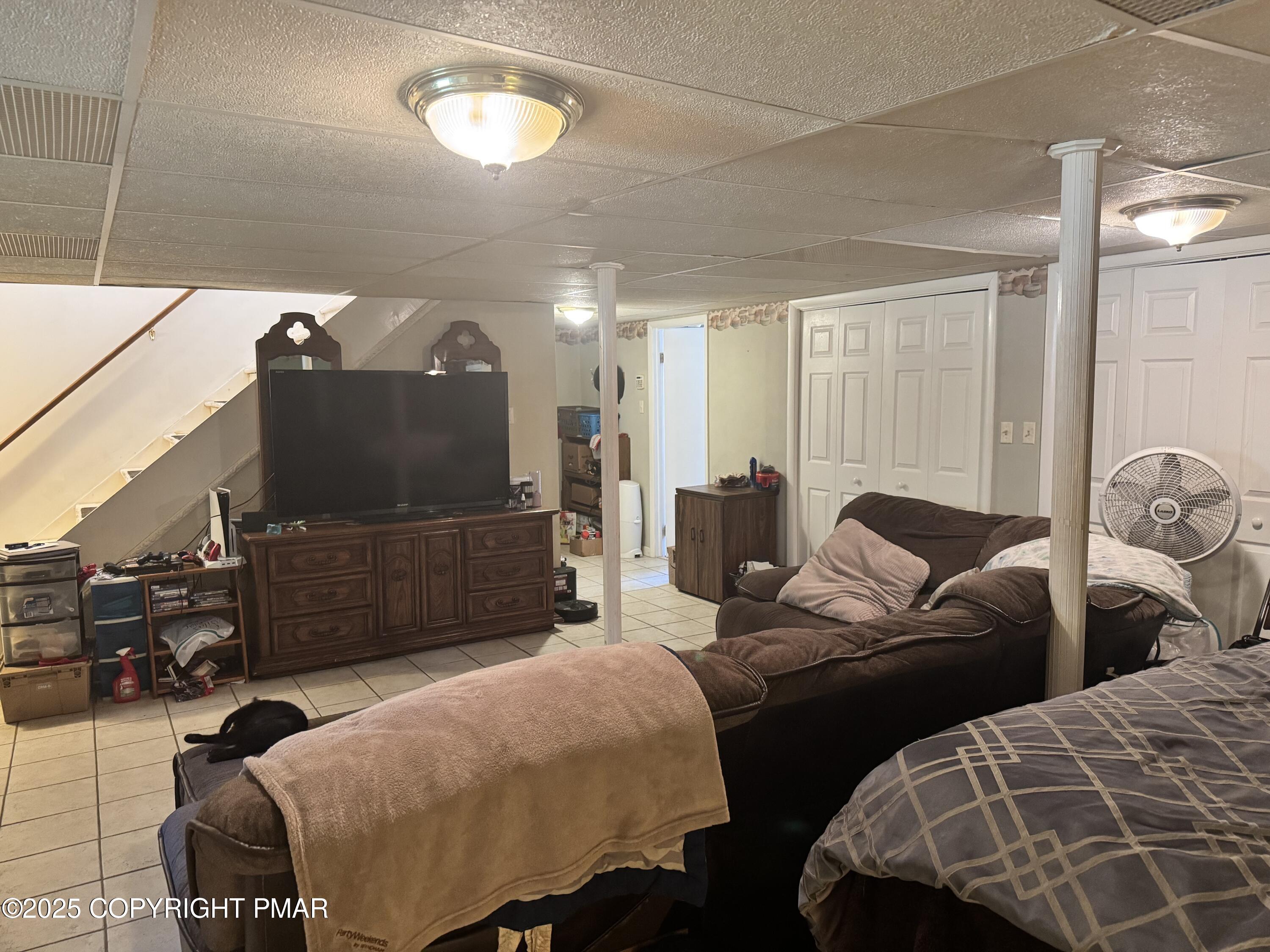 692 Watercrest Avenue Effort, PA 18330 - Photo 23 of 40 a living room with furniture and a flat screen tv