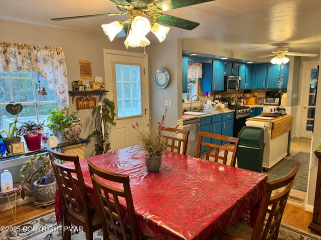 a view of a dining room with furniture
