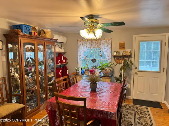 a view of a dining room with furniture