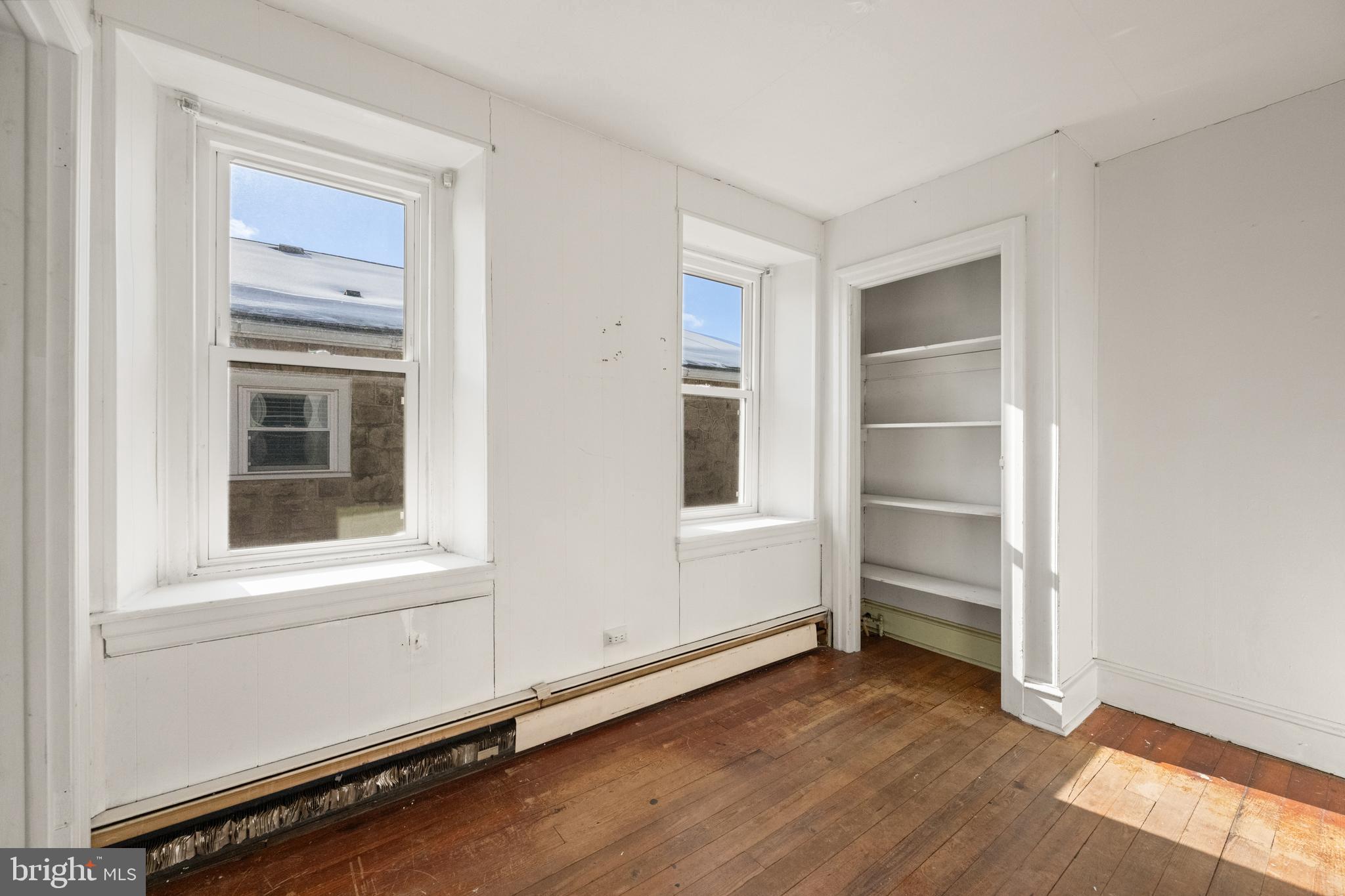 458 Renfrew Avenue Ambler, PA 19002 - Photo 25 of 31 a view of an empty room with a window and wooden floor