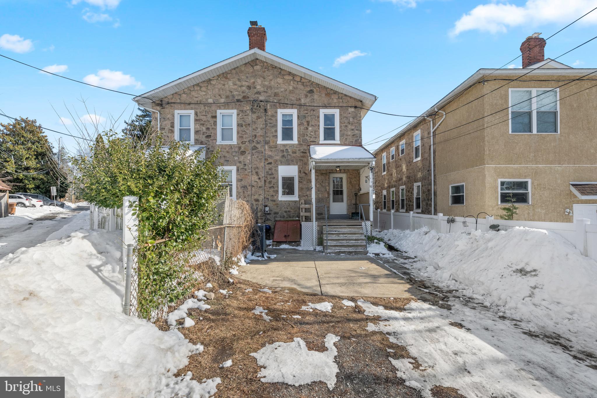 458 Renfrew Avenue Ambler, PA 19002 - Photo 5 of 31 a front view of a house with a yard